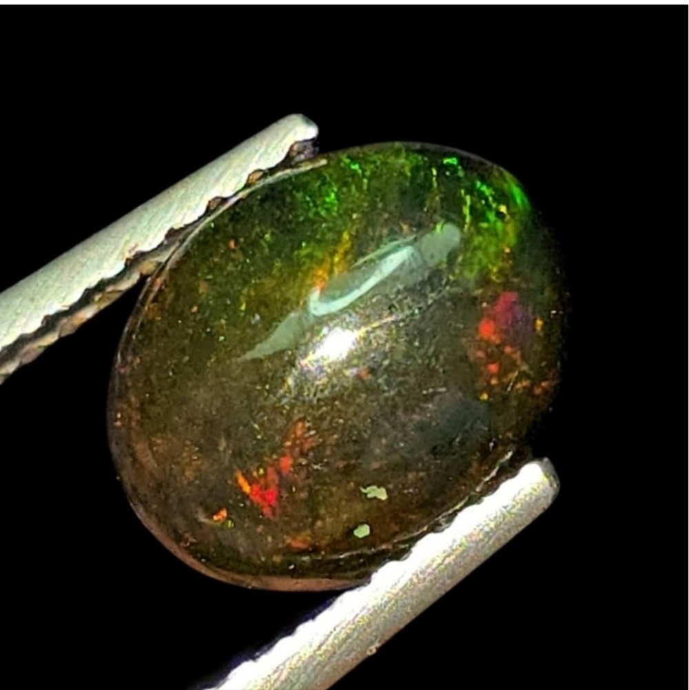 0.95 Ct "Play Of Colors" Natural Black Opal